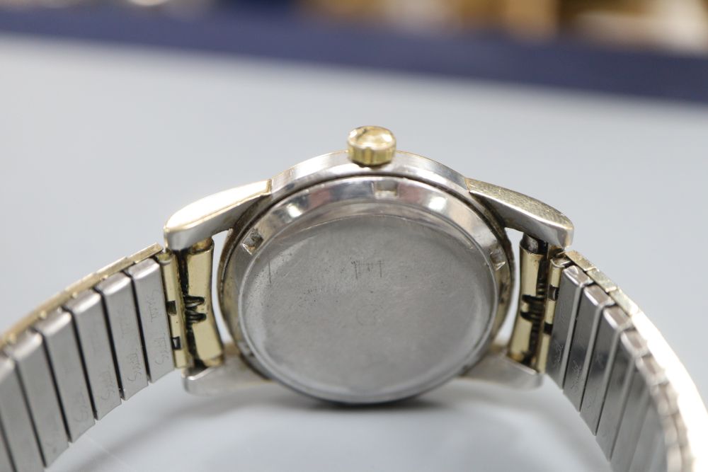 A gentlemans steel and gold plated Omega Automatic Chronometer Seamaster wrist watch, on associated bracelet,